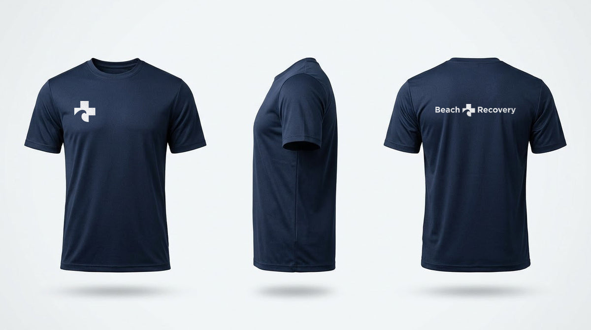 Navy Beach Recovery athletic tee shown front, back and side: the Cross reversed to white at the right chest, the full Beach Recovery signature across the back.