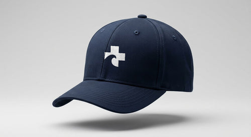 Navy Beach Recovery six-panel cap, front view, with the Cross embroidered in white on the centre front panel.